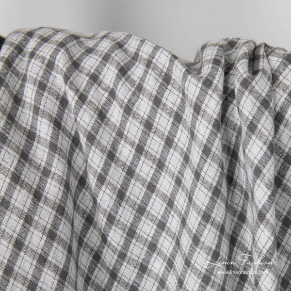 Light grey linen fabric with dark grey checks, washed