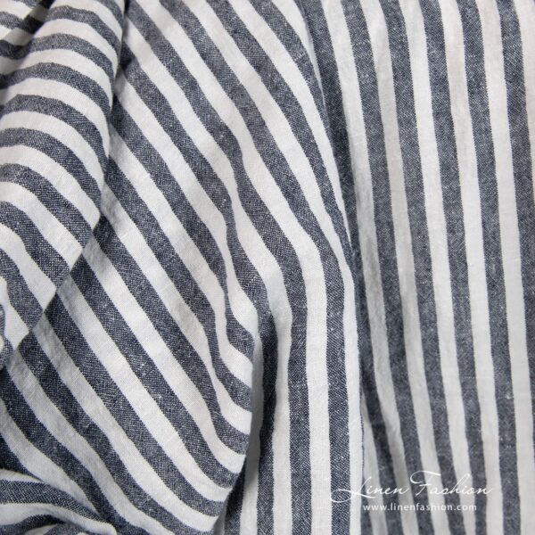 Wide linen fabric in blue stripes, specially washed to increase softness