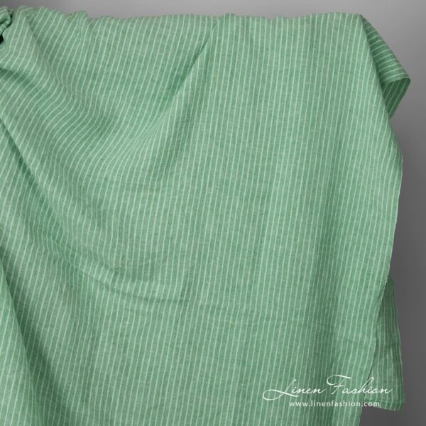 Wide washed green striped linen fabric