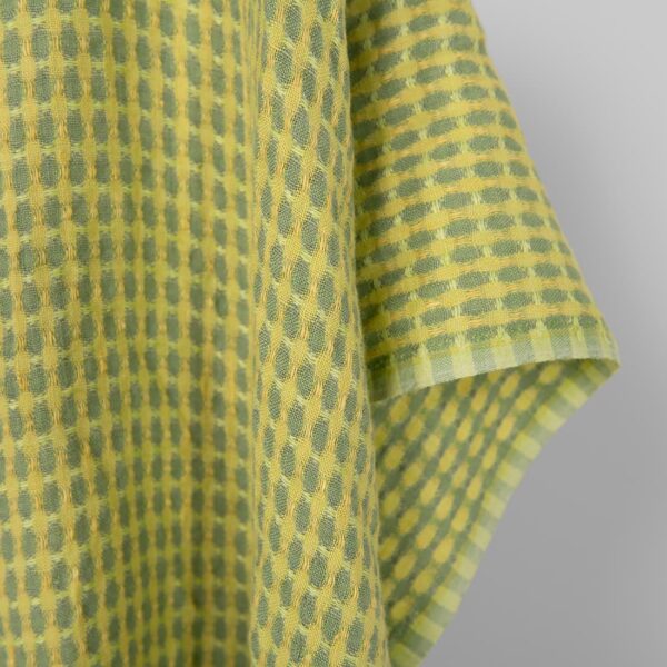 Washed linen fabric yellow and green pattern, fabric edge
