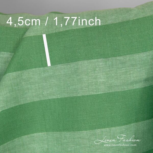 Green dyed linen fabric with stripes.
