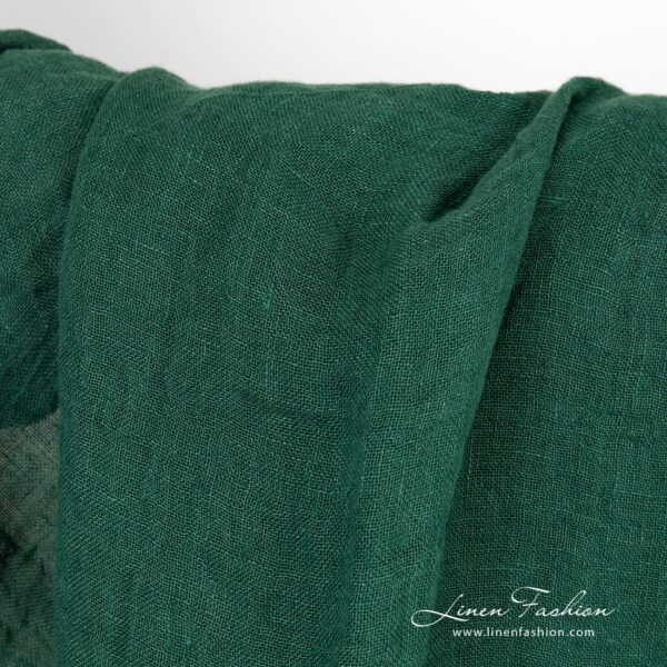 Transparent forest green linen fabric