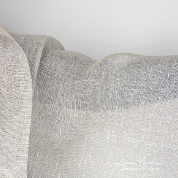 Transparent, lightweight light grey 100% linen fabric woven in a gauze pattern from natural flax grey and optical white yarns