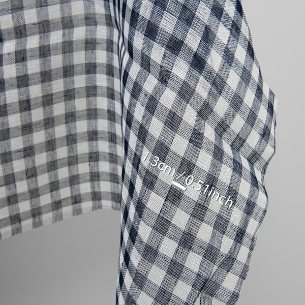 Linen fabric in dark blue and white checks, with measurements