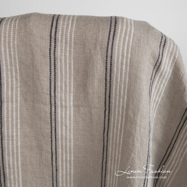 Grey brown linen fabric in stripes, specially washed to increase softness
