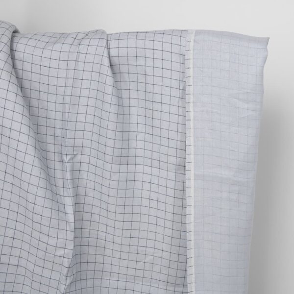 Tessuto di lino double-face grigio chiaro a quadretti blu
