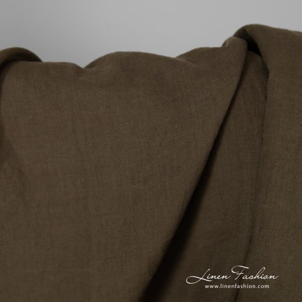 Washed linen fabric in ivy green colour.
