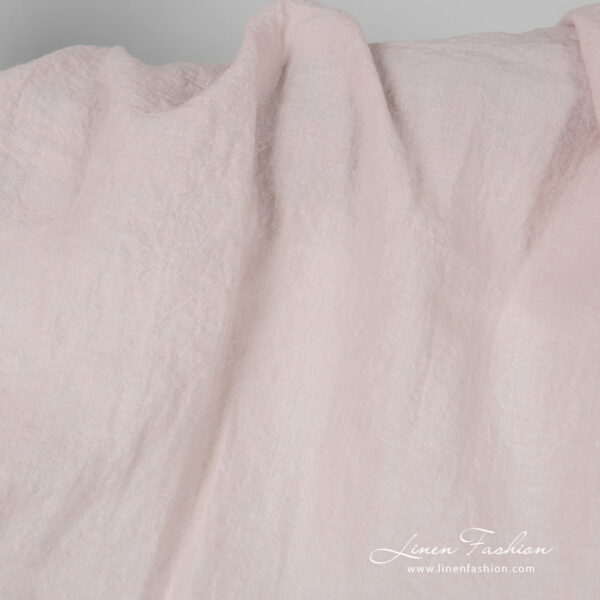 Wide light pink linen fabric, washed