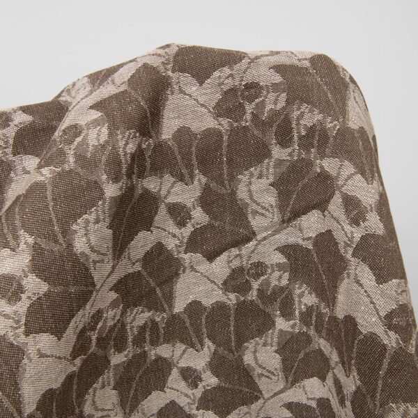 Brown linen blend jacquard fabric close up detail