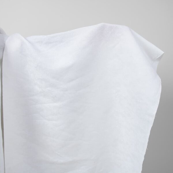 Optical white linen cotton fabric with flower ornaments