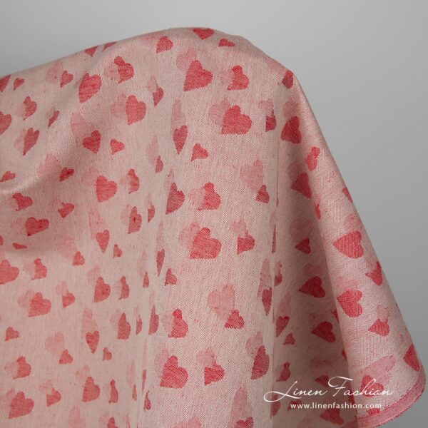 Jacquard double-sided half linen fabric has been woven from bright red and pale grey-brown colours yarns