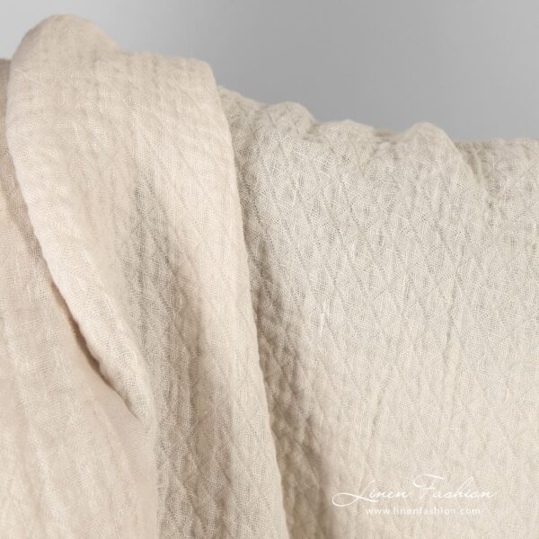Light cream linen fabric in rhombus, washed