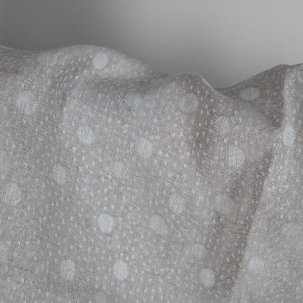 Grey linen fabric in bubble pattern close up detail