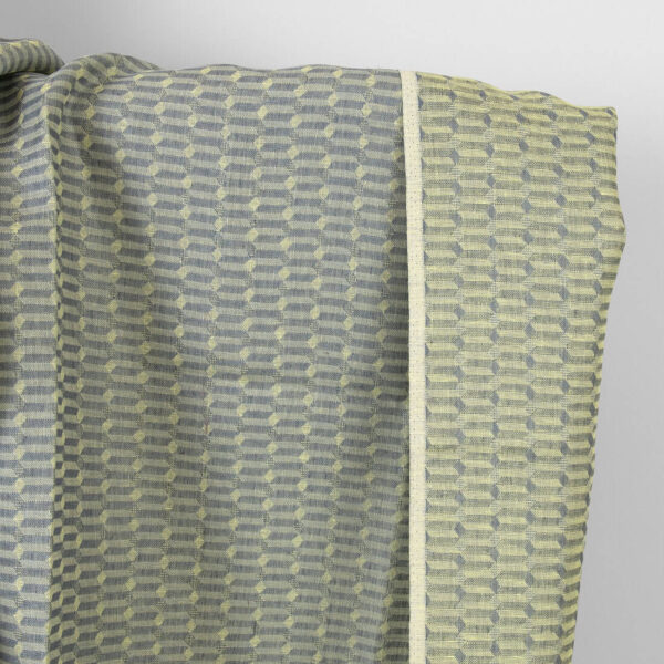 Tessuto di lino grigio giallo a motivi geometrici