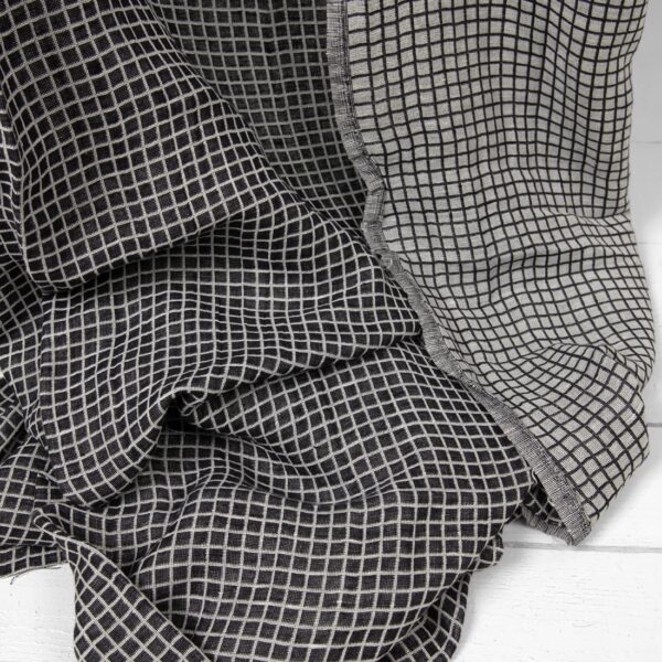Half-linen fabric in black and white checks washed texture