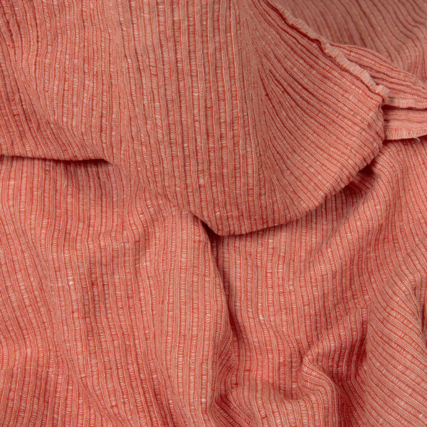 Washed linen cotton fabric in red-white stripes detail view