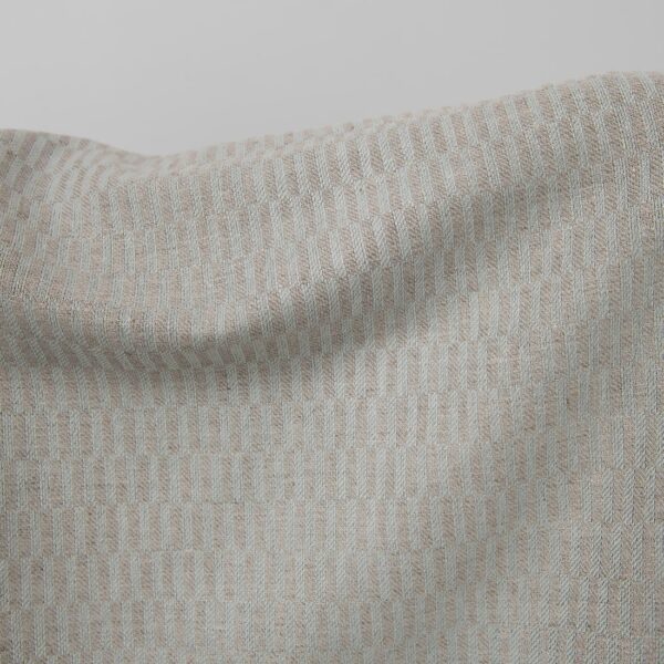 Blue and grey patterned linen cotton fabric close up detail