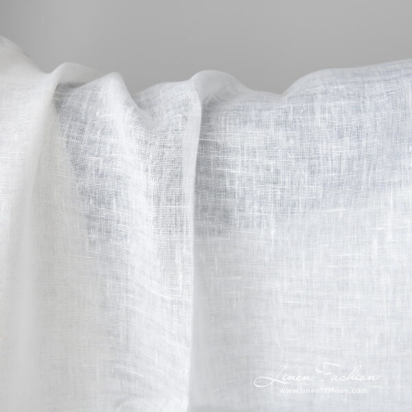 Lightweight linen fabric bright white colour close up detail