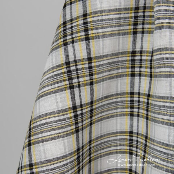 Black yellow checked linen fabric.