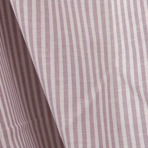 Wide linen cotton fabric in white and lilac stripes close up detail