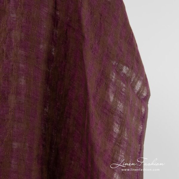 Washed 100% linen fabric in checks.