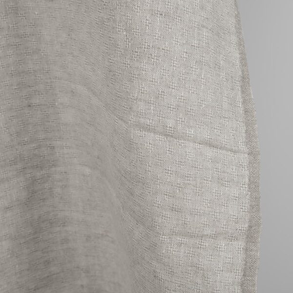 Openwork patterned linen fabric in beige edge