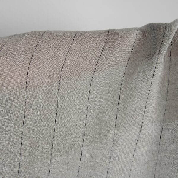 Natural transparent linen fabric with black stripes washed close up detail