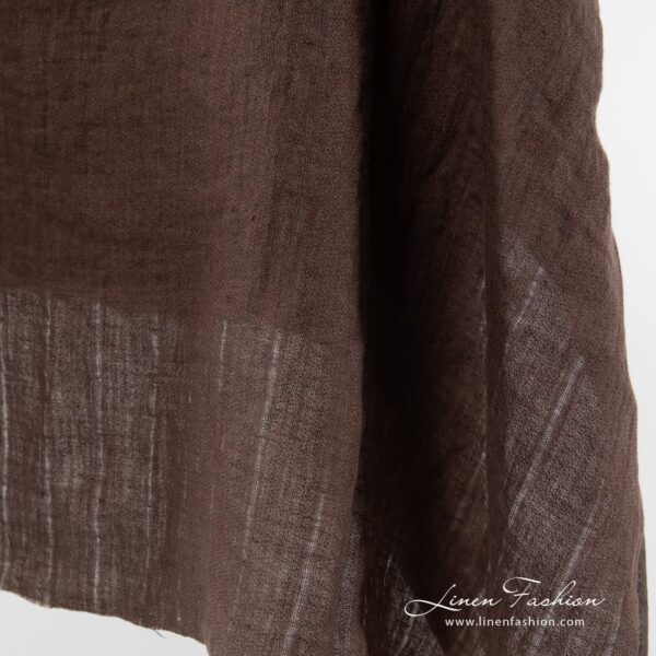 Striped washed linen fabric in brown.