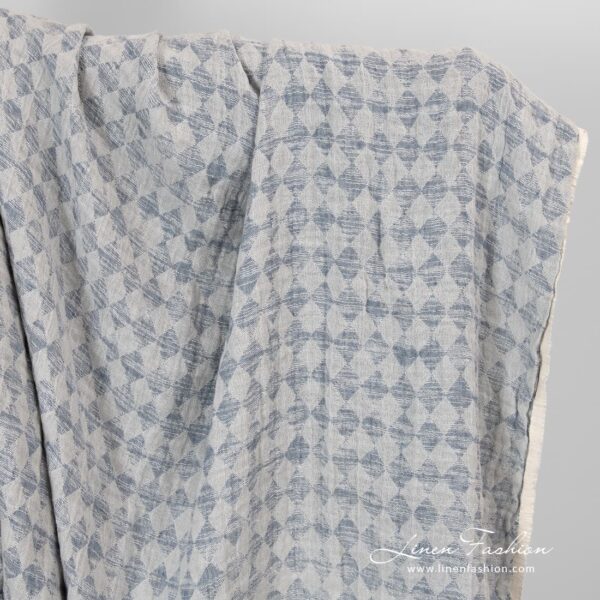Linen cotton fabric in grey rhombus washed.