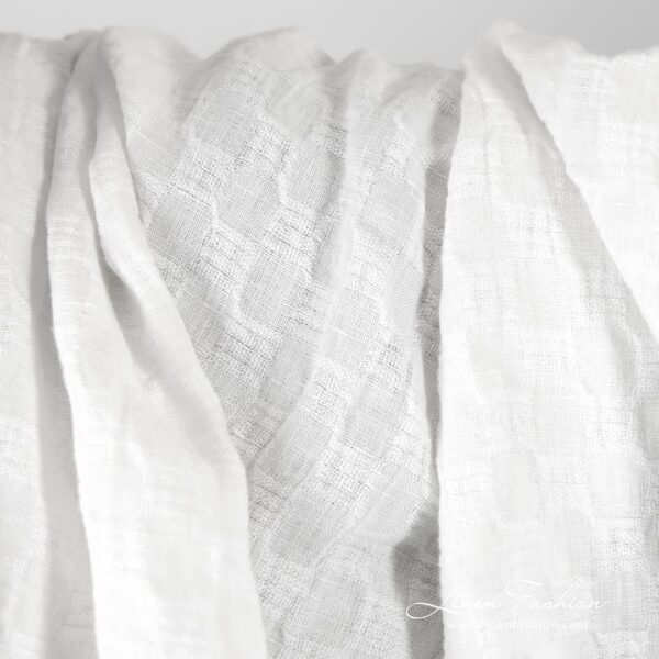 Optical white linen fabric in checks, specially washed to increase softness