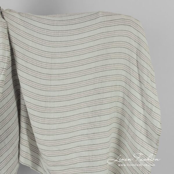 Green striped linen fabric in waffle pattern