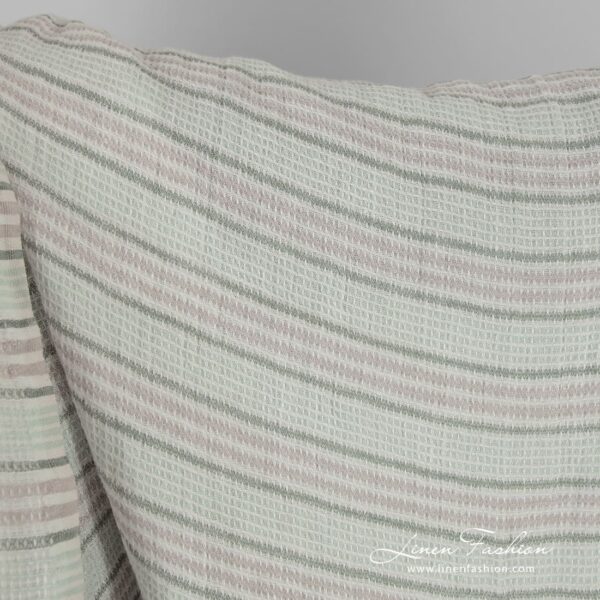 Green striped linen fabric in waffle pattern, washed