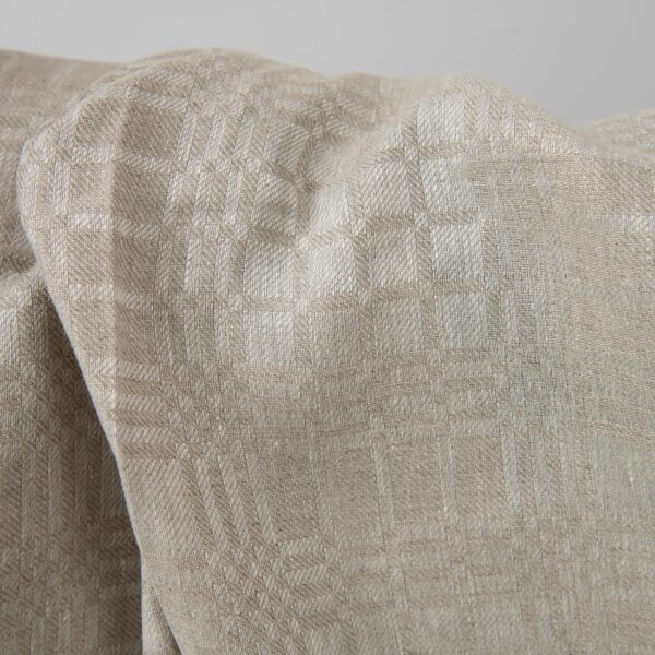 Beige linen fabric in checks dobby close up detail