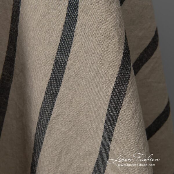 Wide washed half linen fabric natural colour black stripes close up detail