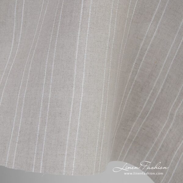 Natural color linen fabric in delicate white stripes