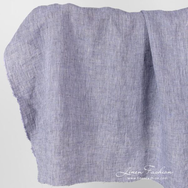 Linen fabric in black violet checks, washed.