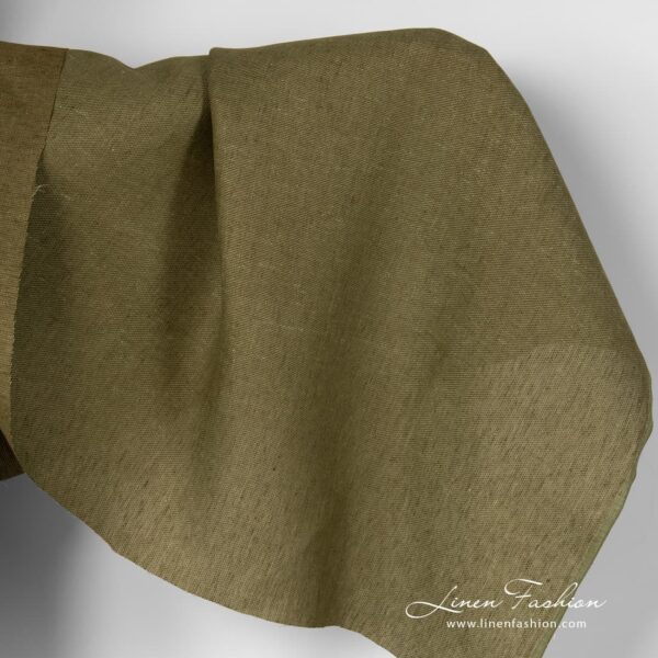 Moss green linen fabric in diagonal pattern.