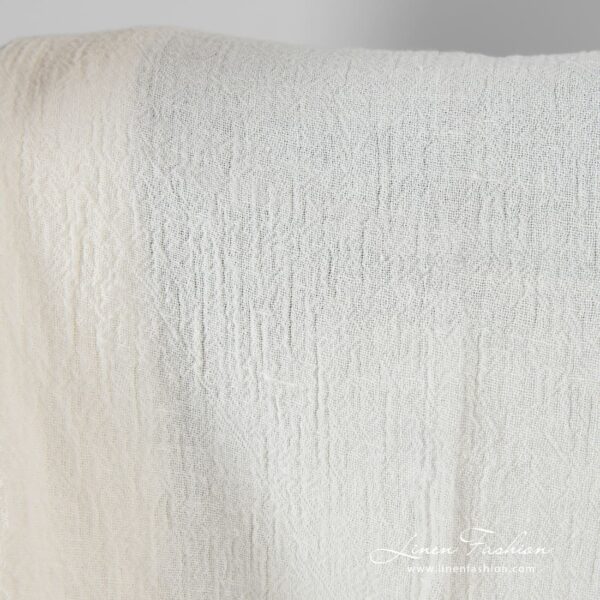 Linen fabric in off-white color, plain weave pattern