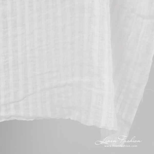Striped 100% linen fabric in off white colour.