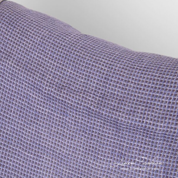 Linen fabric woven from several shades of violet color yarns