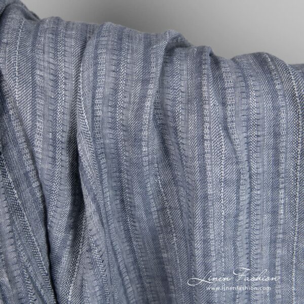 Blue grey linen fabric in vertical stripes, specially washed to increase softness