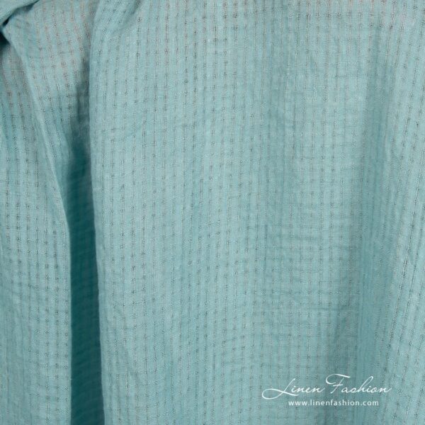Blue green linen fabric in transparent checks, specially washed