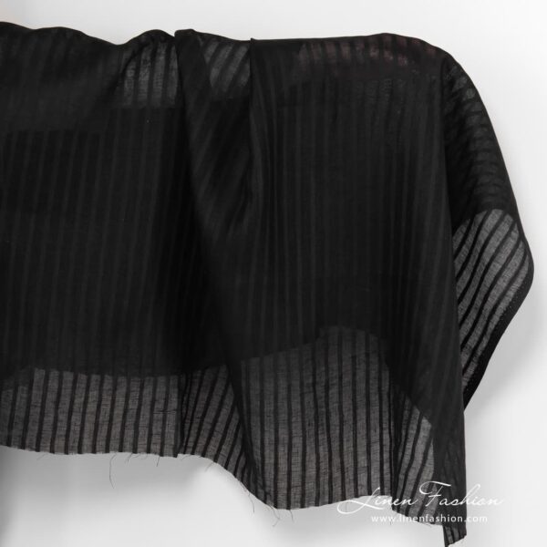Black lightweight striped linen fabric.