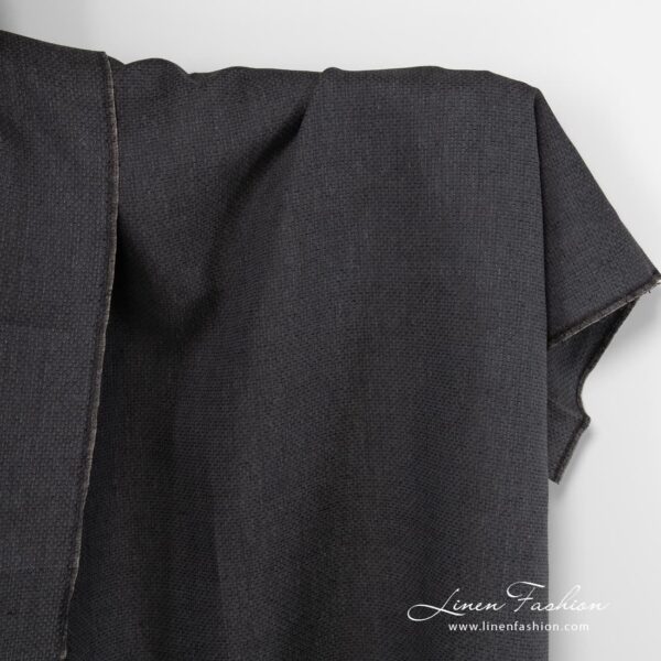 Black patterned linen fabric.