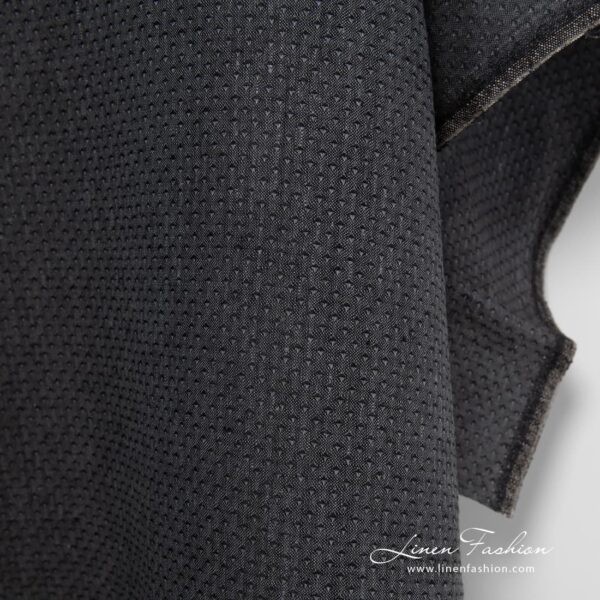Patterned 100% linen fabric in black.