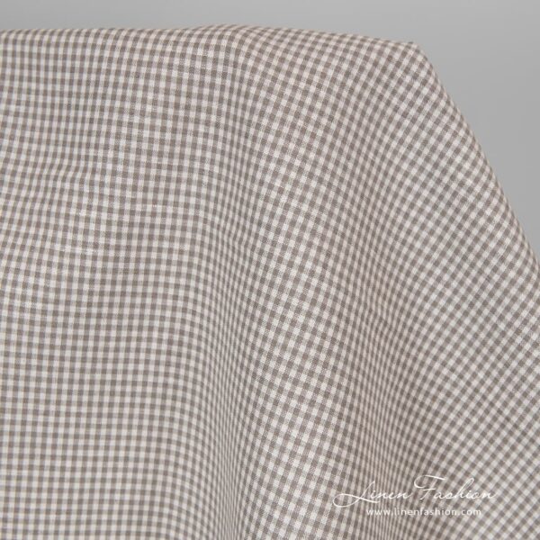 Linen cotton fabric in grey white checks.