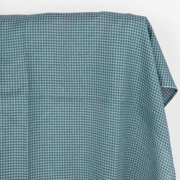 Tessuto di lino grigio-blu scuro e acquamarina a quadretti